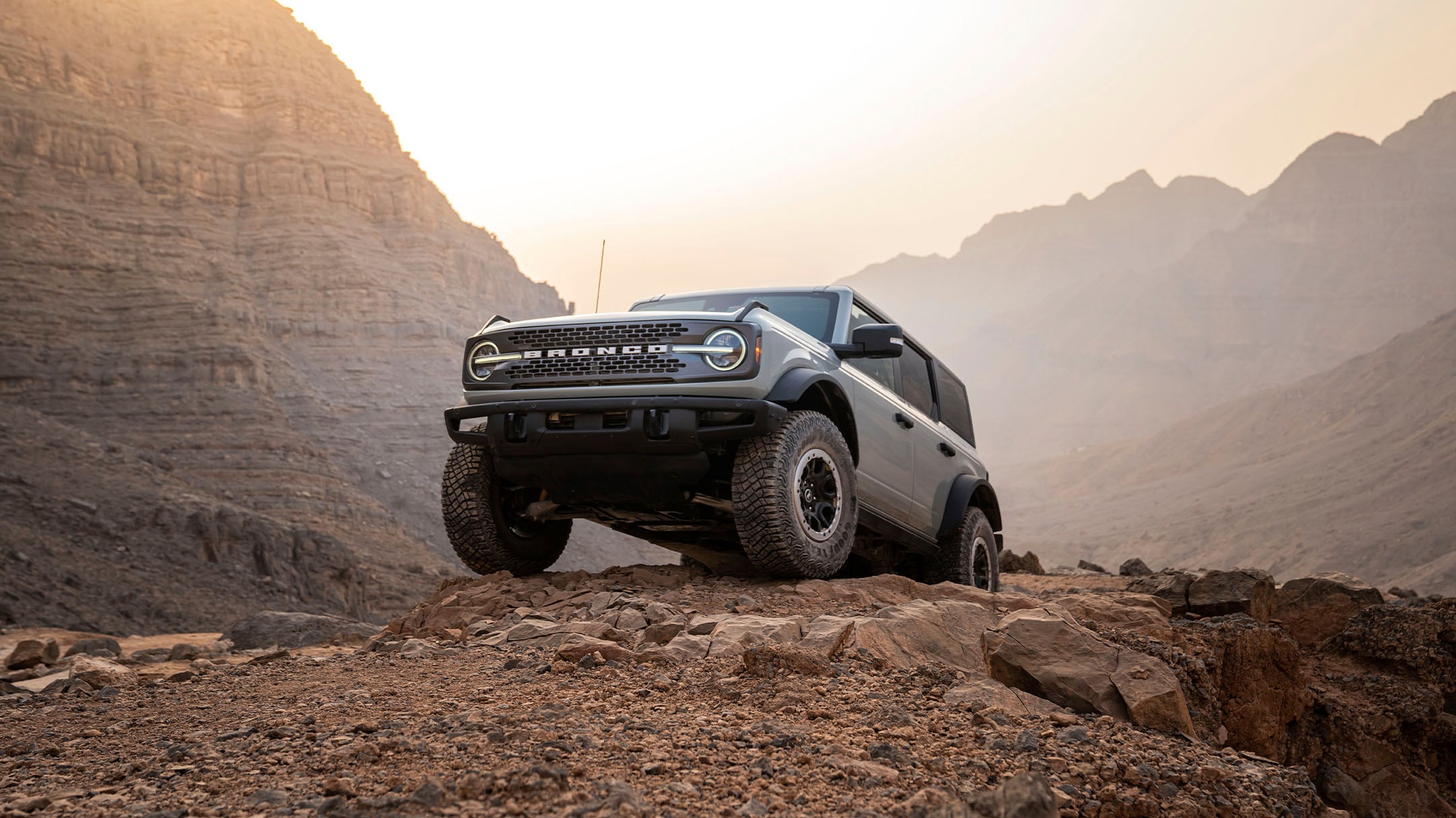 Ford Bronco Parked On Rocks In The Desert Mo